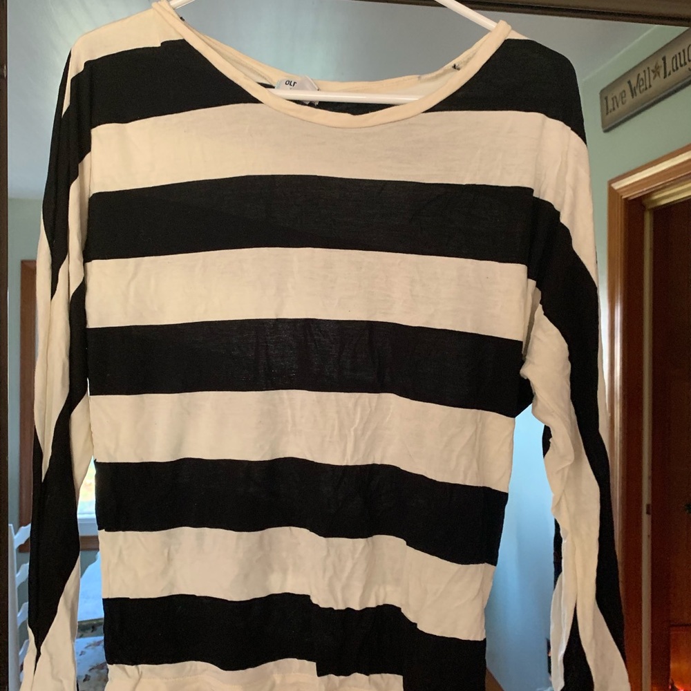 Assortment of woman’s shirts. Can sell separately